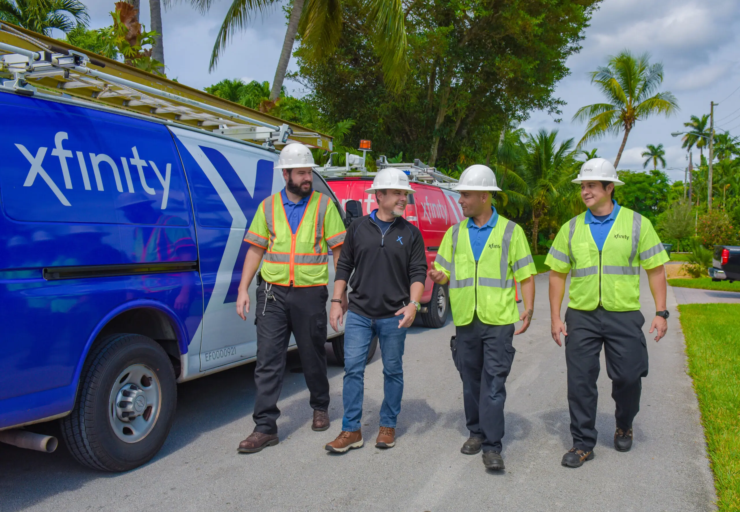 technicians walking down a street