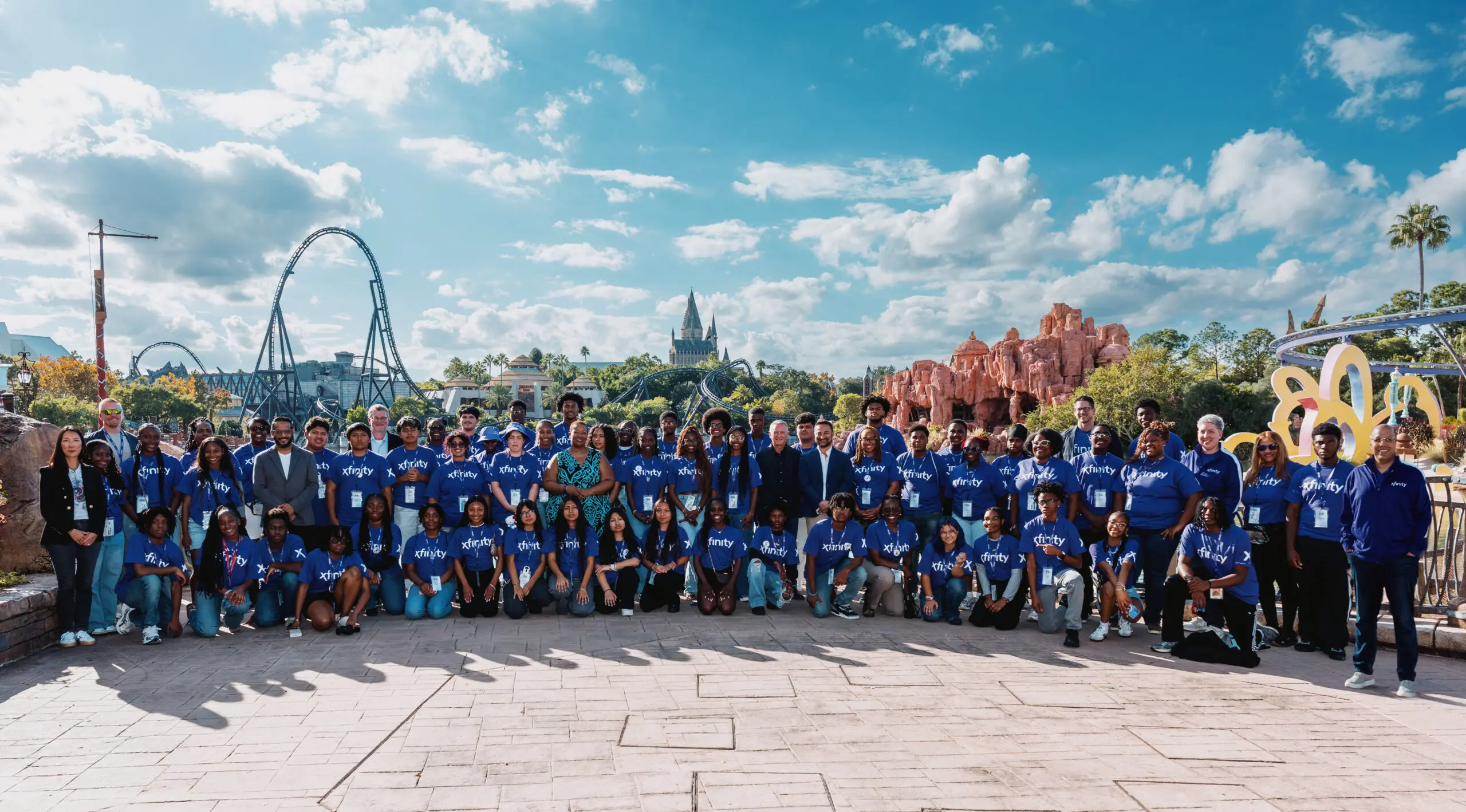 Gorup of students pose for a picture at Universal Studios in Orlando.
