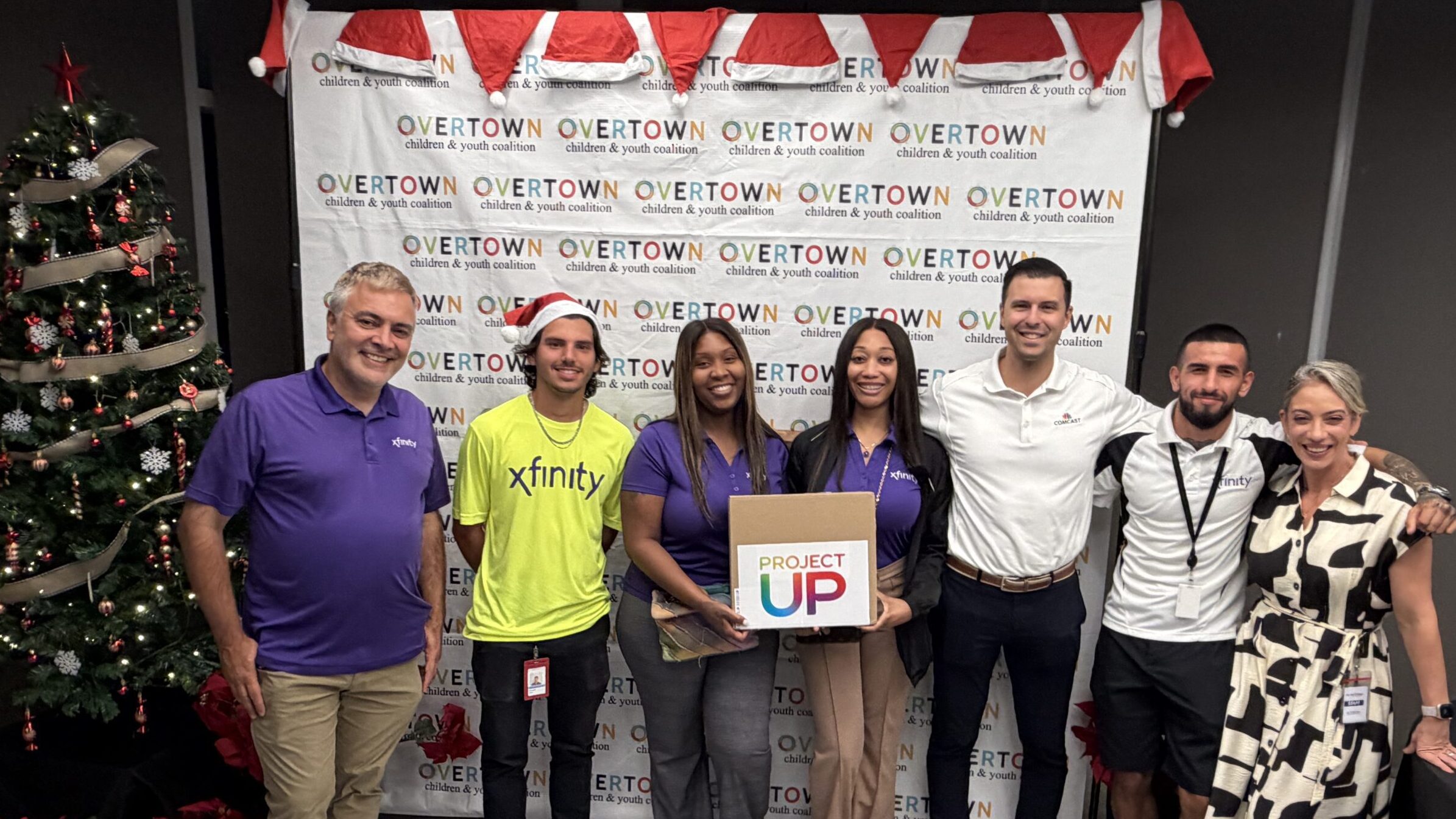 Comcast team members gather for a photo at the event.